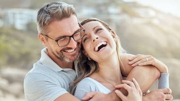 Happy couple enjoying a bright day together